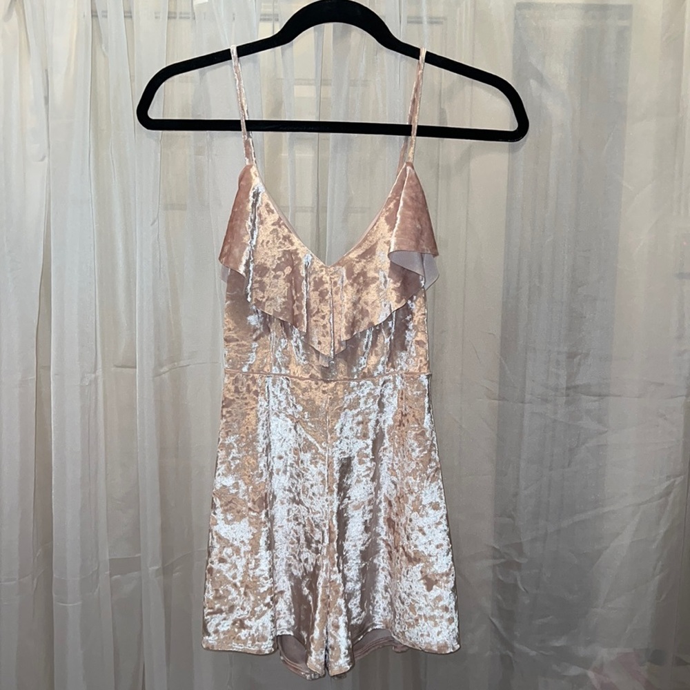 Urban Outfitters velvet champagne romper. Ties at the back.